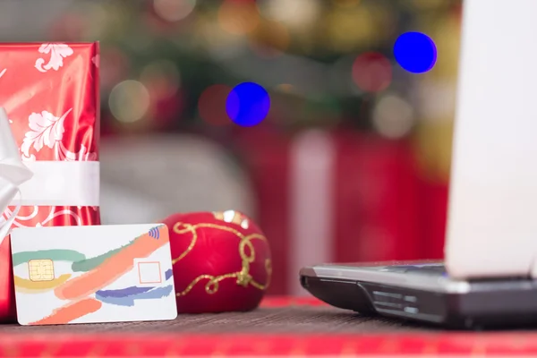 Credit card and lap top,Christmas night e-shop concept