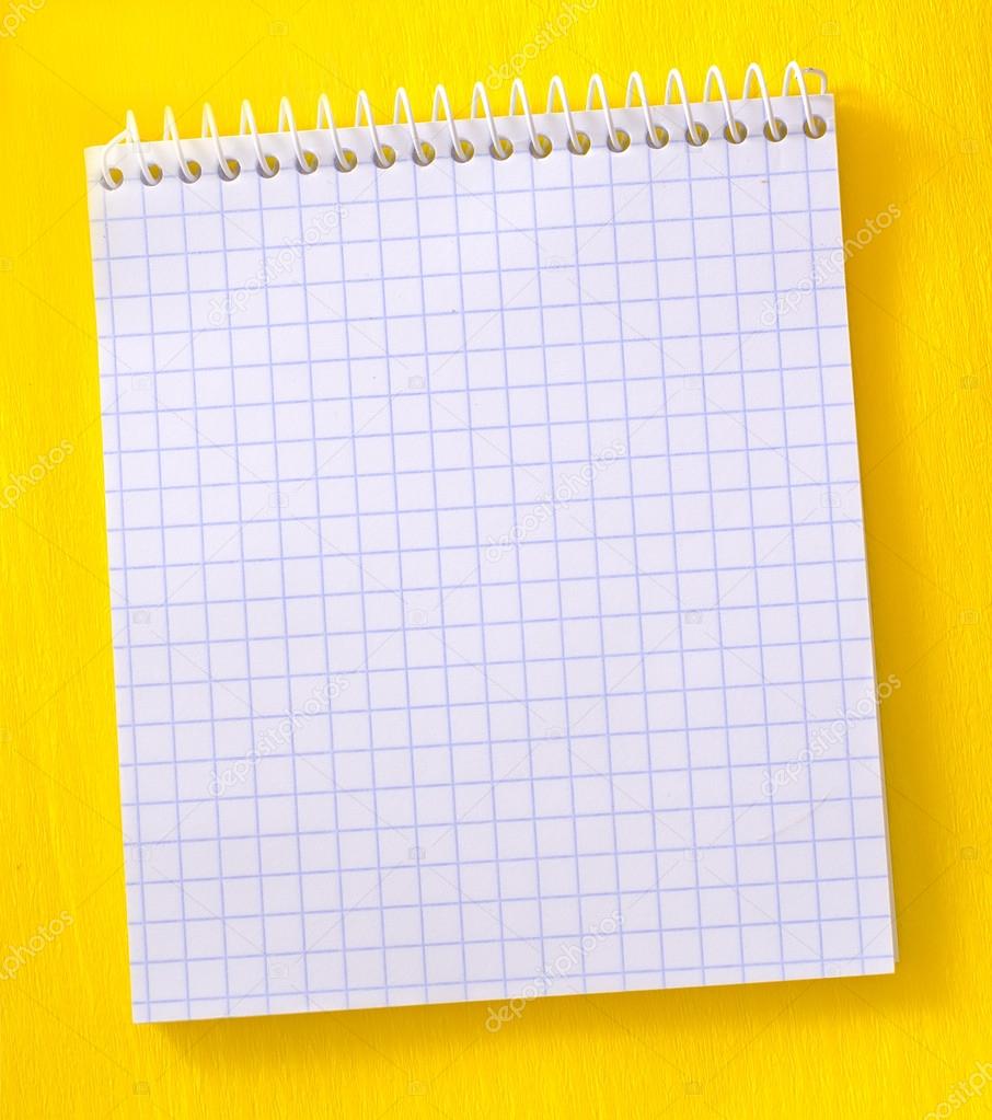 Notepad on a yellow background — Stock Photo © tycoon 14309563