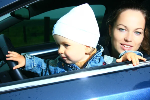 Mother and son in a car