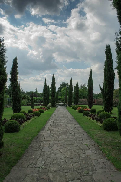 View of pathway in gardens, England