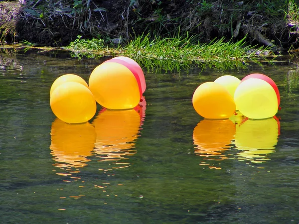 Balloons on water