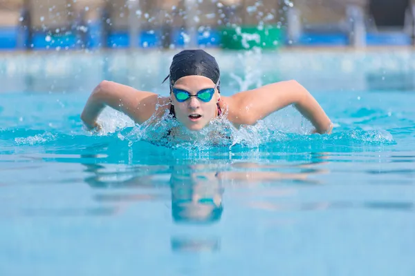 Girl swimming front crawl stroke style