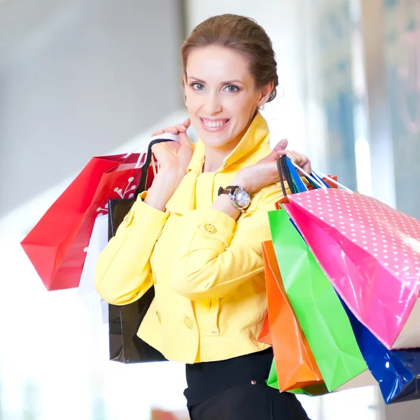 Shopping woman with color bags — Stock Photo #37222765