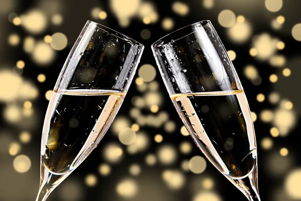 Champagne glasses on bokeh background
