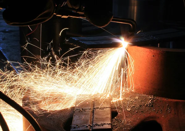 Sparks from are sharp metal