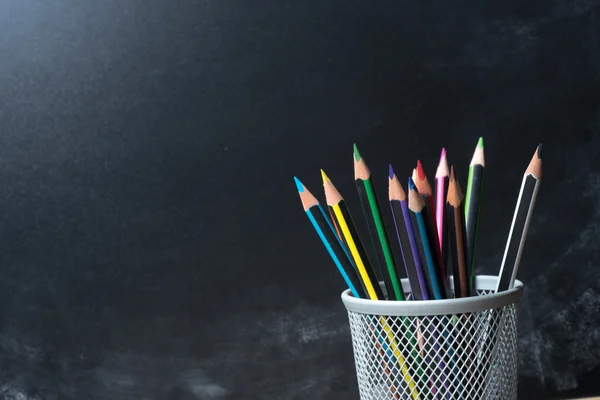 Colorful pencils in pencil cup