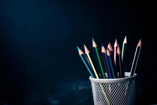 Colorful pencils in pencil cup