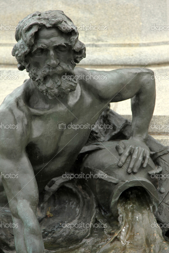 Statue of Man Pouring Water Montreal, Canada — Stock Photo © imagex 13960183