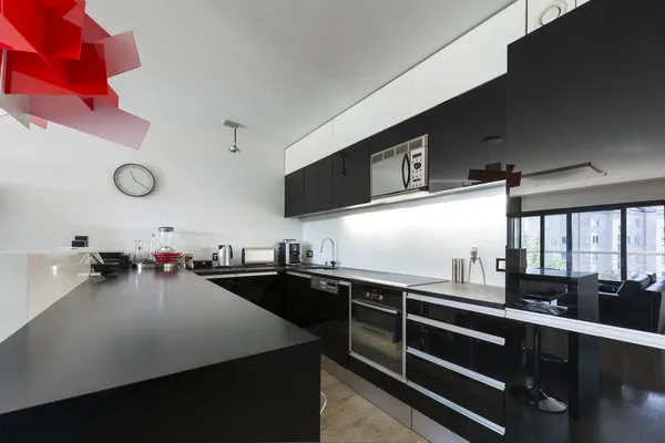 Modern black and white kitchen interior