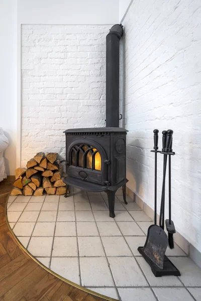 Old fireplace in modern interior