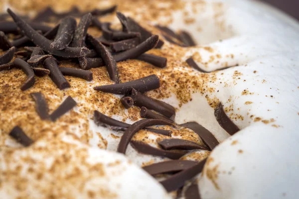Chocolate flakes on the coffee foam