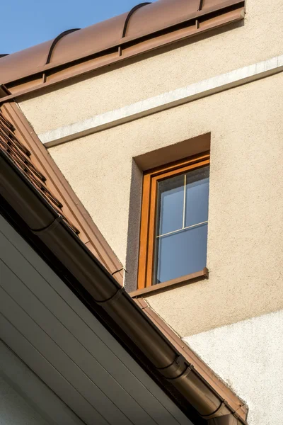 Single wooden window in multi family house