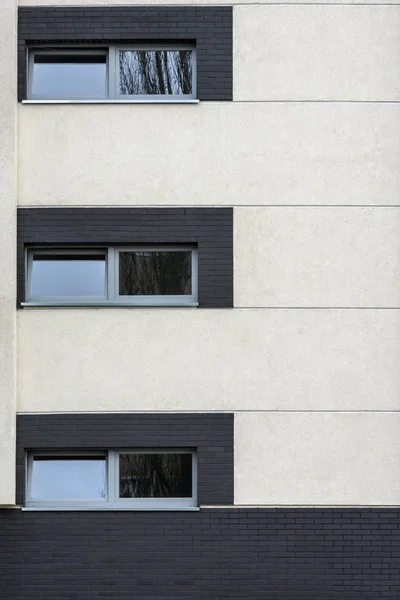 Small windows in multi family house exterior