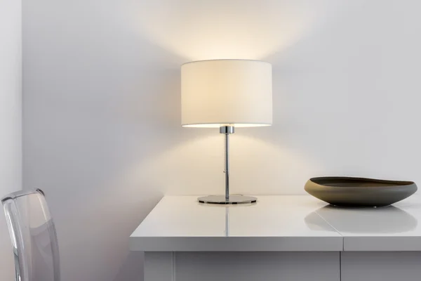 Deatil of modern interior design, table and lamp