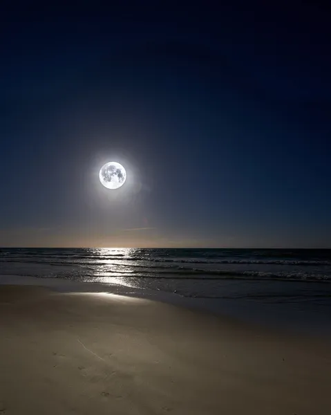 A night photo of moon, beach and ocean, Denmark