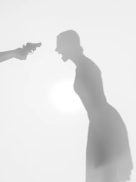 Woman threatened with a gun, screaming, silhouette