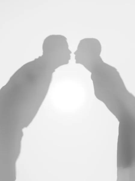 Couple kissing, silhouette