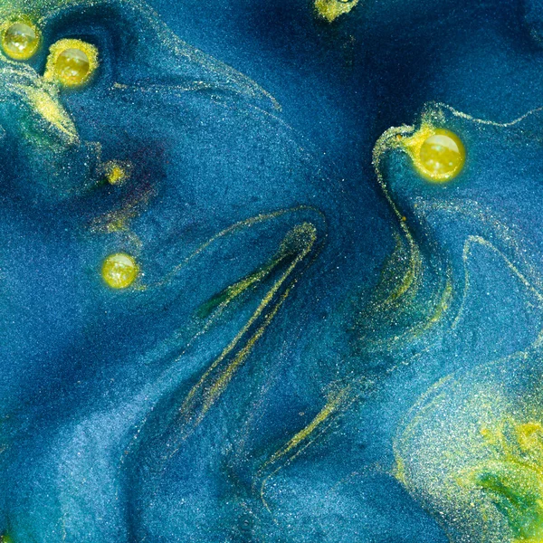 Abstract blue pigment with yellow insertions