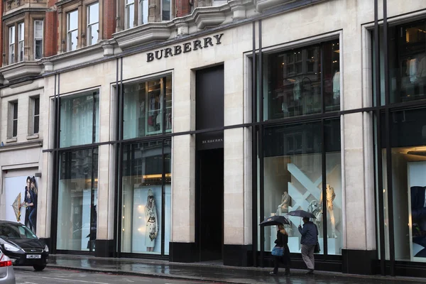 LONDON - MAY 14: Shoppers visit Burberry store on May 14, 2012 in London. Burberry exists since 1856 and has 473 stores. Business Weekly claims Burberry is the 98th most valuable brand worldwide.