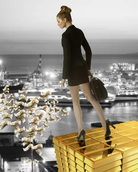 Nice business woman on gold tower near sea port