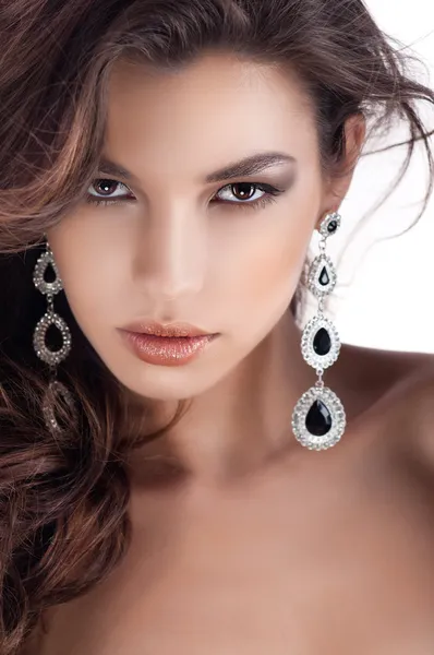Woman with jewelry earrings