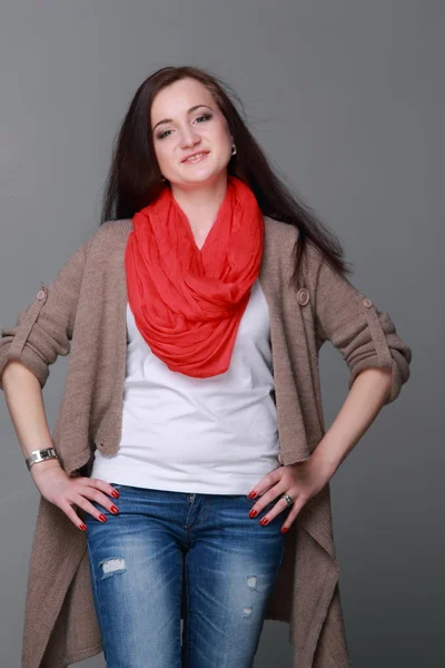 Beautiful girl with a red scarf