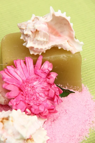 Decoration of sea salt, handmade soap, beautiful sea shell and pink flower