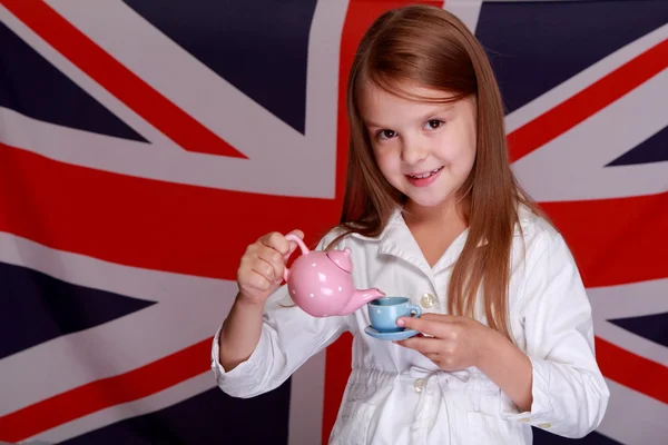 Girl on a background of the flag UK