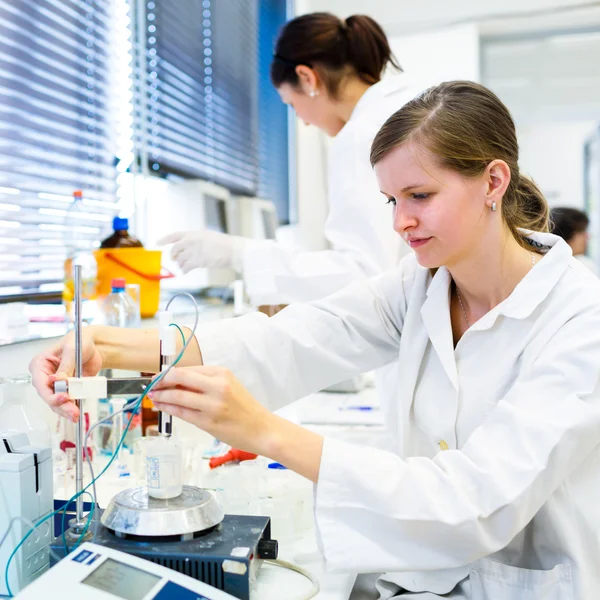 Portrait of a female researcher carrying out research in a chemistry lab