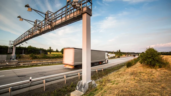Truck passing through a toll gate