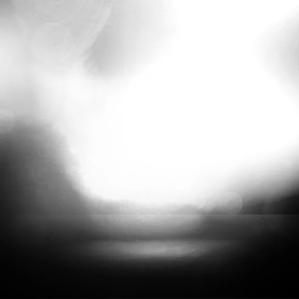 Abstract black and white blur background with bokeh