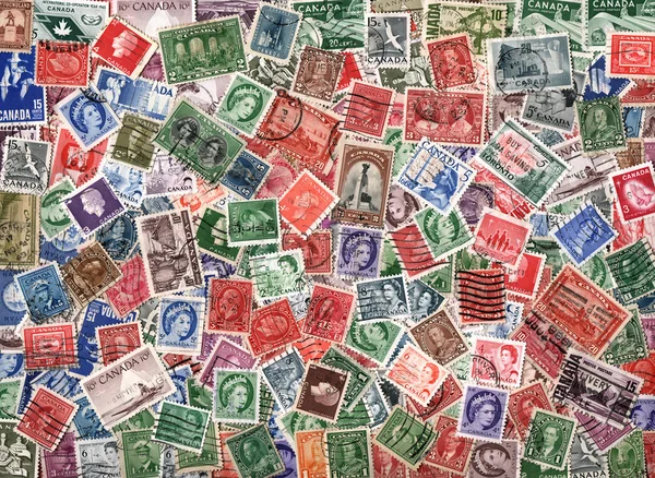 Background of old Canada postage stamps