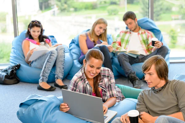 Students sitting on beanbags in study room