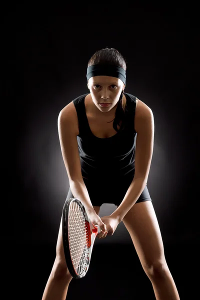 Tennis woman black ready to play racket