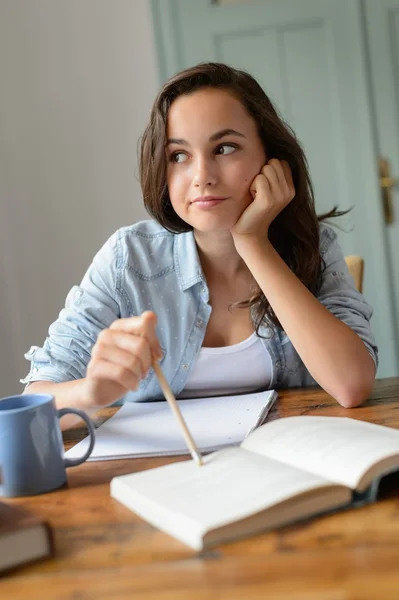 Student girl studying at home