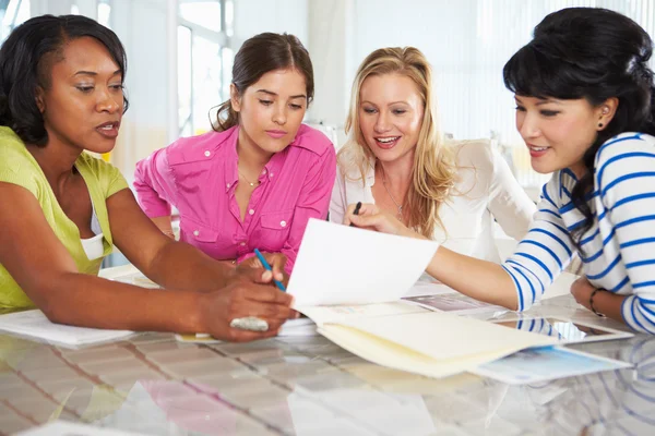 Group Of Women Meeting In Creative Office