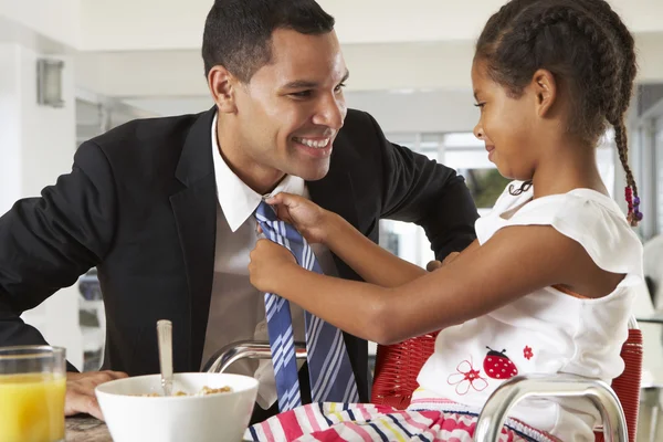 Daughter Straightens Father\'s Tie Before He Leaves For Work