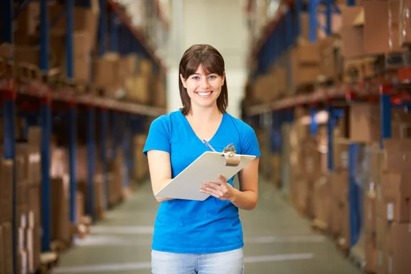 Female Worker In Distribution Warehouse