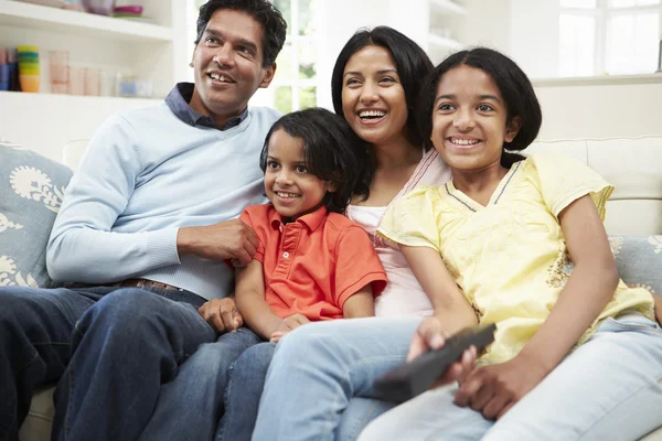 Indian Family Watching TV Together