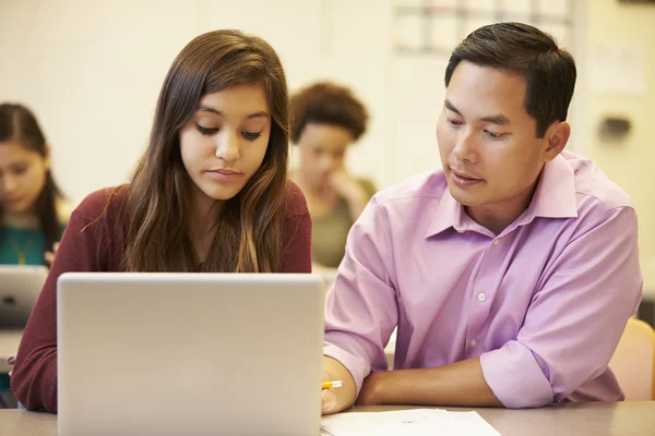 High School Student With Teacher