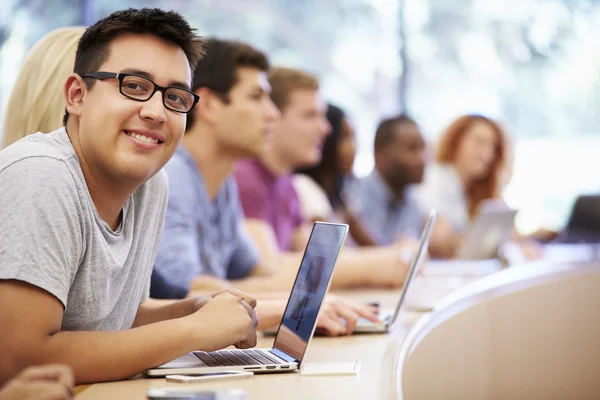 Class Of University Students Using Laptops In Lecture