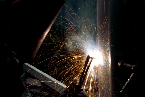 Welding and bright sparks. Hard job