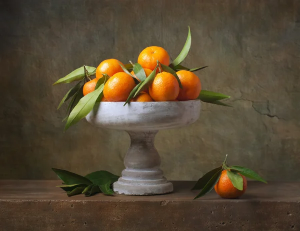 Vintage still life with tangerines