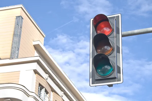 Traffic lights against sky backgrounds