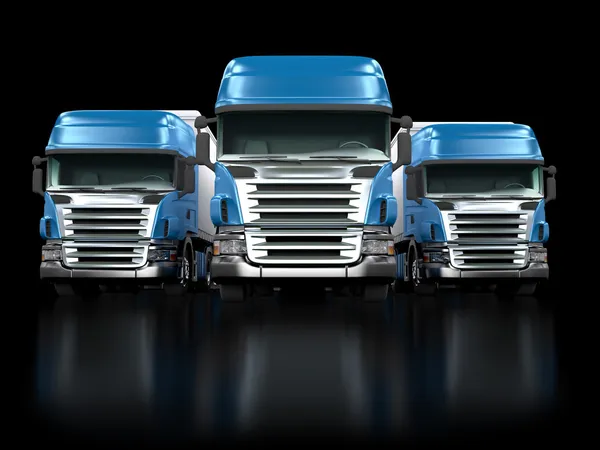 Heavy blue trucks isolated on black