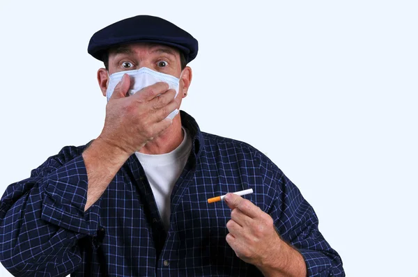 Man with breathing mask and cigarette