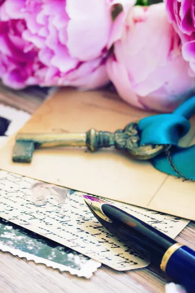 Quill pen and antique letters