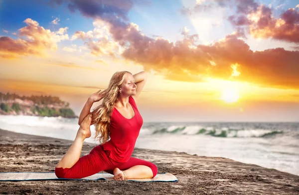 Yoga at sunset beach