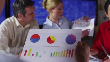 72 Senior Businesswoman In Office With Her Colleagues