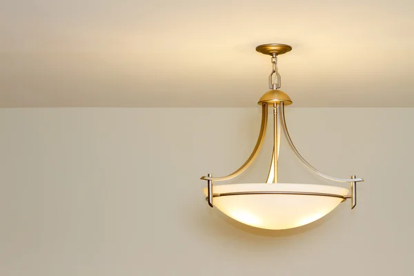 Modern ceiling lamp in a new home